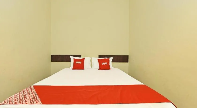 Bed in SPOT ON 91178 Motel Impian