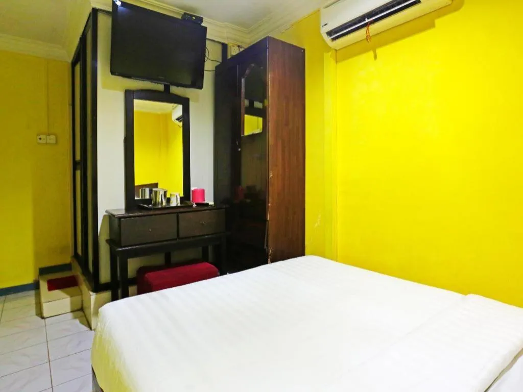 Bed in OYO 89822 Hotel As Salam