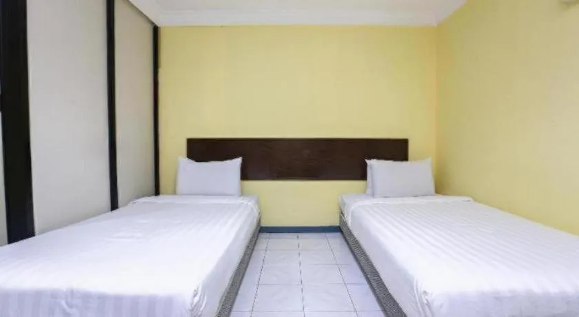 Bed in OYO 89822 Hotel As Salam