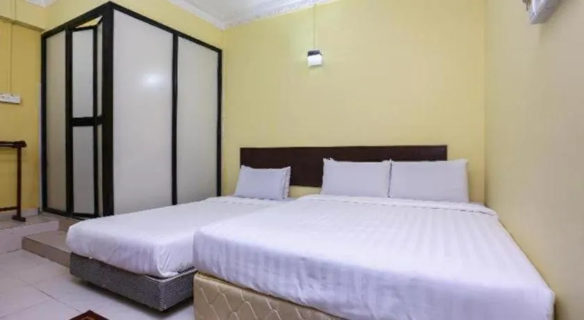 Bed in OYO 89822 Hotel As Salam