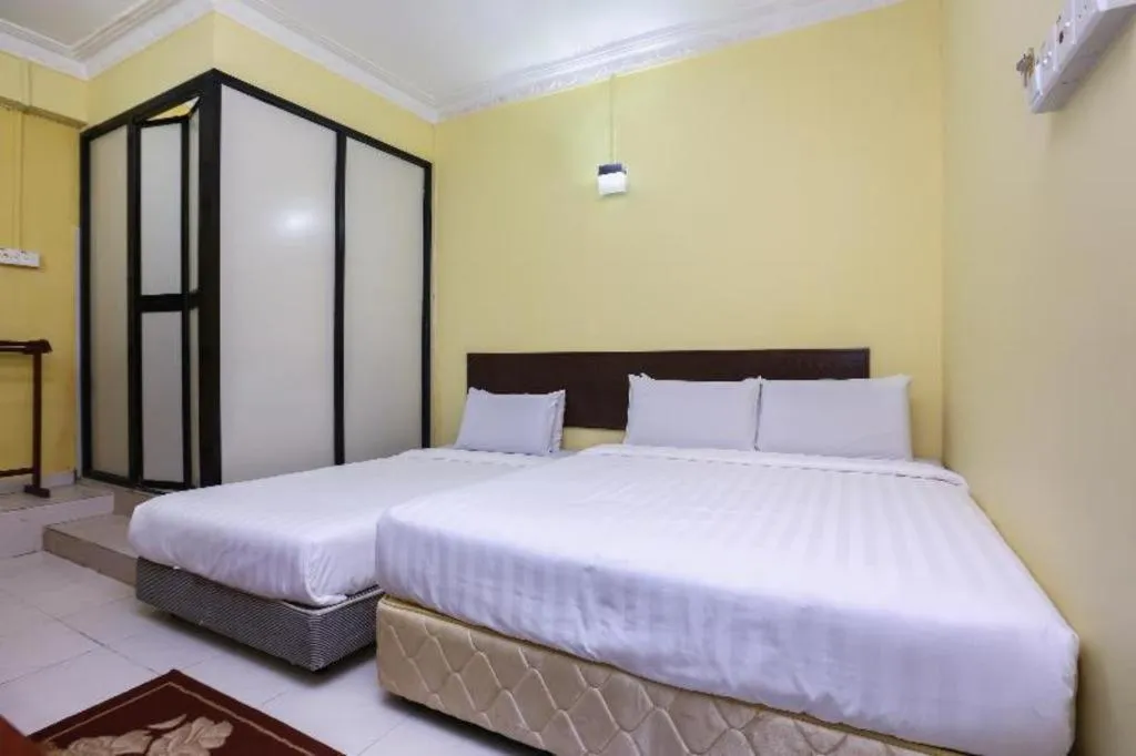 Bed in OYO 89822 Hotel As Salam