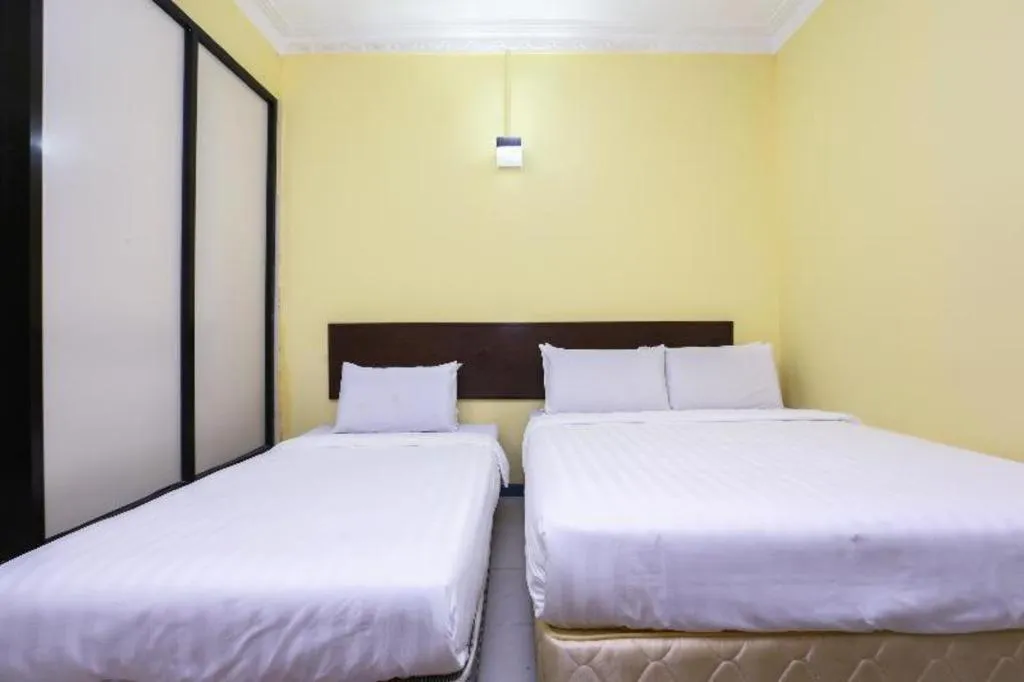 Bed in OYO 89822 Hotel As Salam