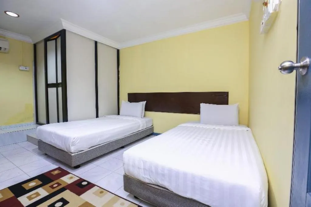 Bed in OYO 89822 Hotel As Salam