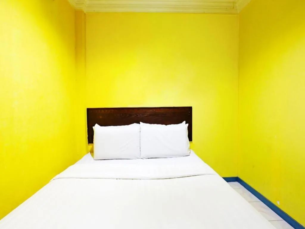 Bed in OYO 89822 Hotel As Salam