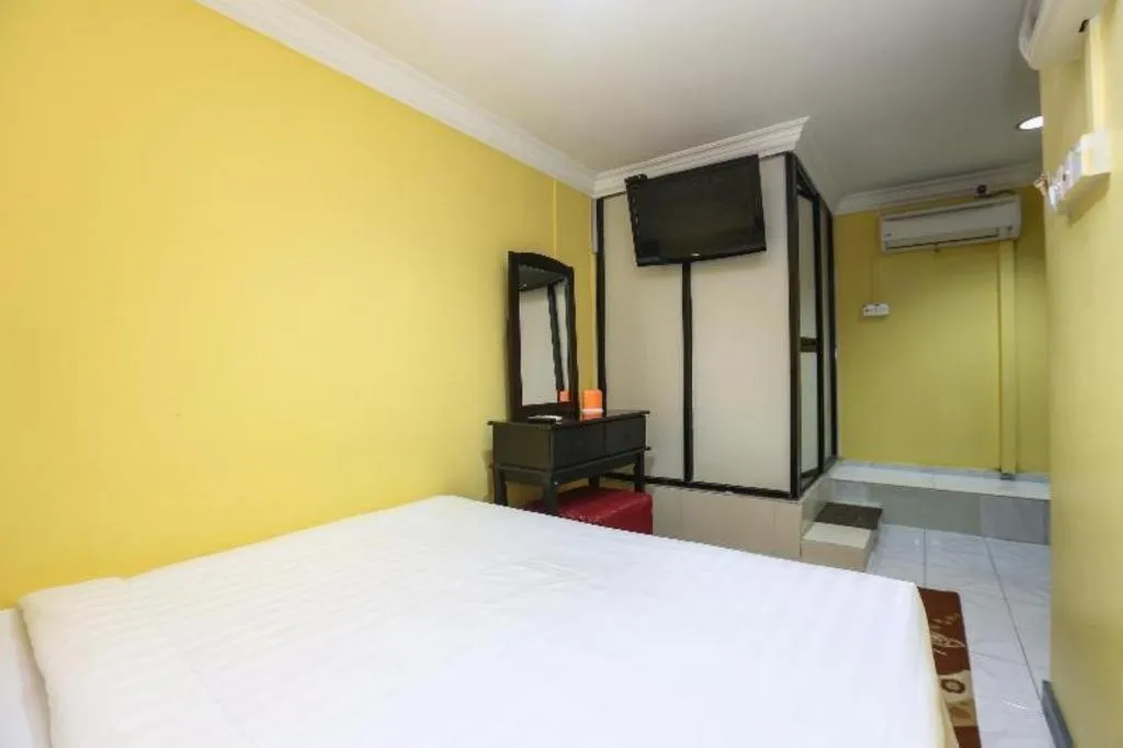 Bed in OYO 89822 Hotel As Salam