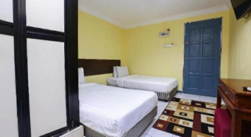 Bed in OYO 89822 Hotel As Salam