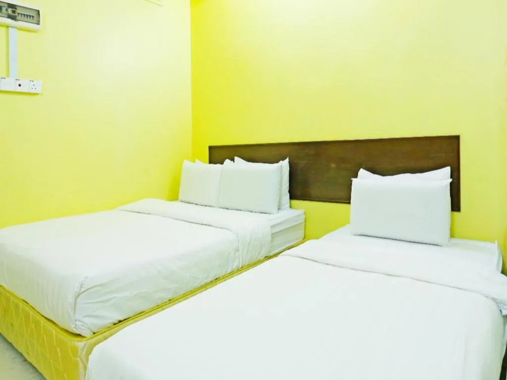 Bed in OYO 89822 Hotel As Salam