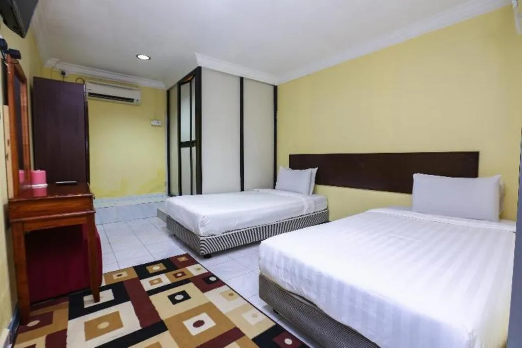 Bed in OYO 89822 Hotel As Salam