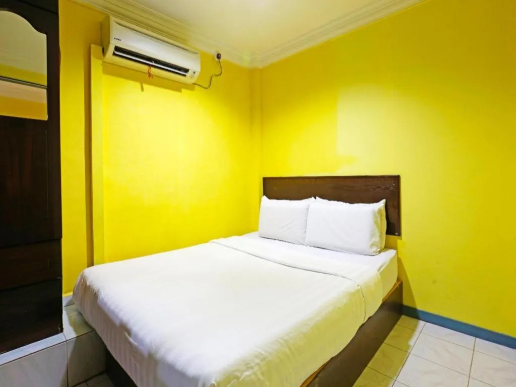 Bed in OYO 89822 Hotel As Salam