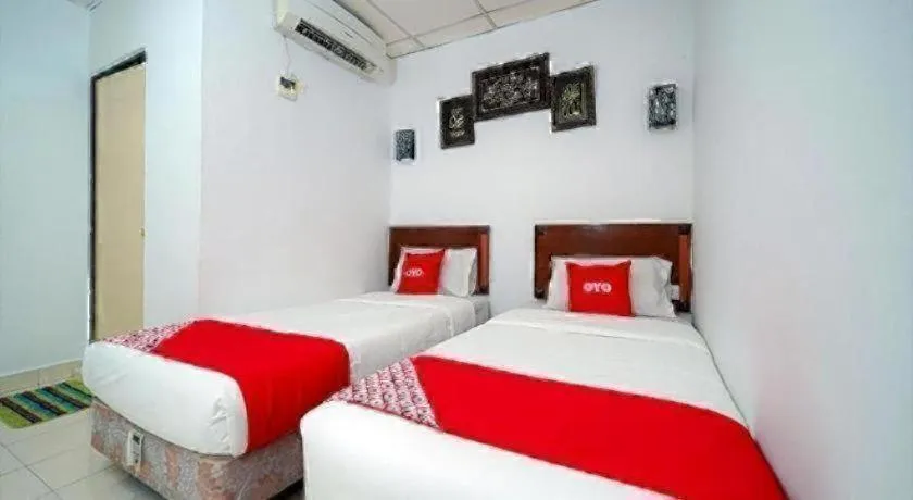 Bed in OYO 89850 Mutiara Motel