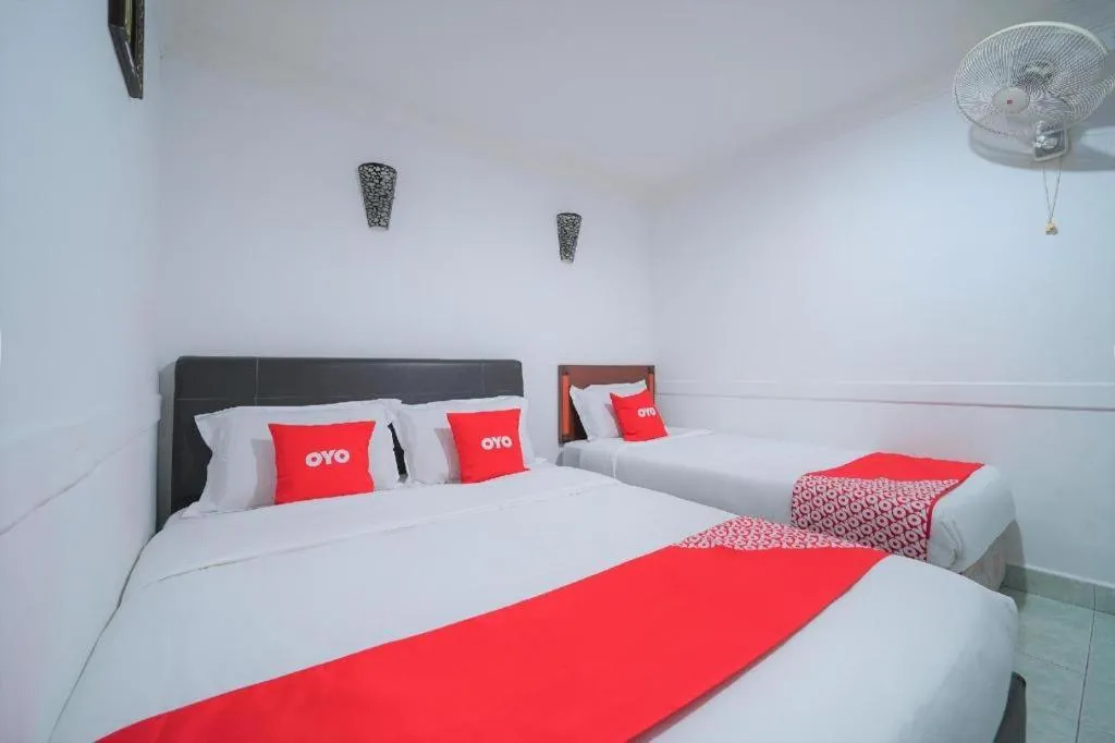 Bed in OYO 89850 Mutiara Motel