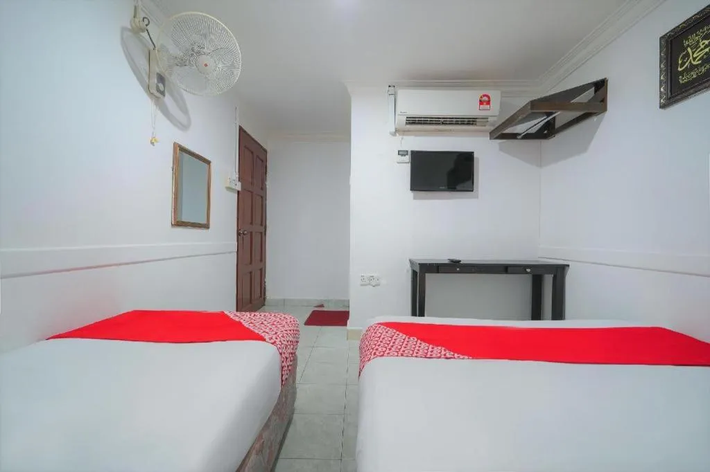 Bed in OYO 89850 Mutiara Motel