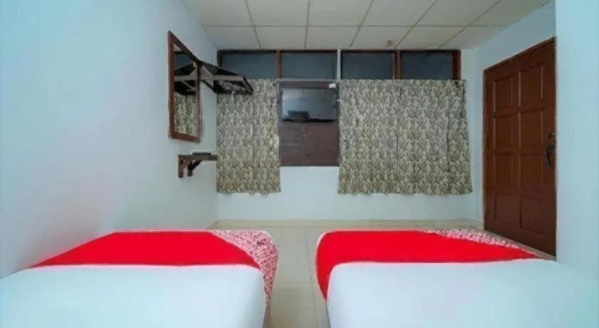 Bed in OYO 89850 Mutiara Motel