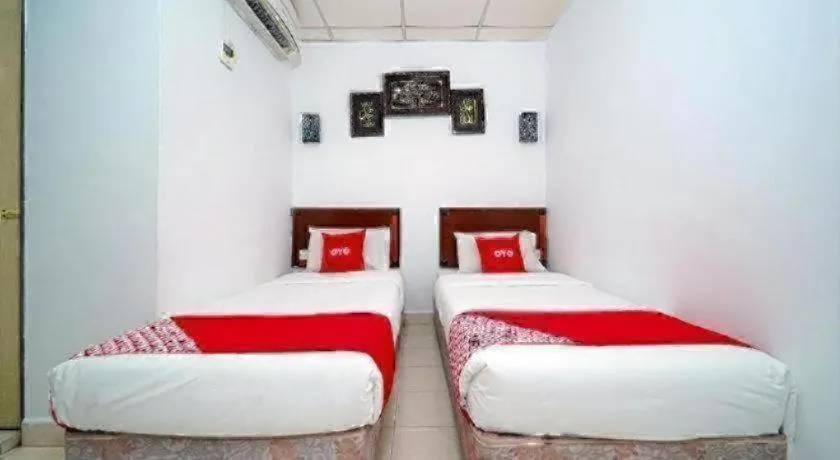 Bed in OYO 89850 Mutiara Motel
