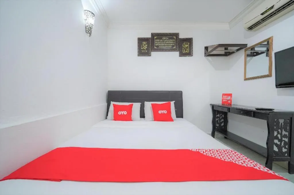 Bed in OYO 89850 Mutiara Motel