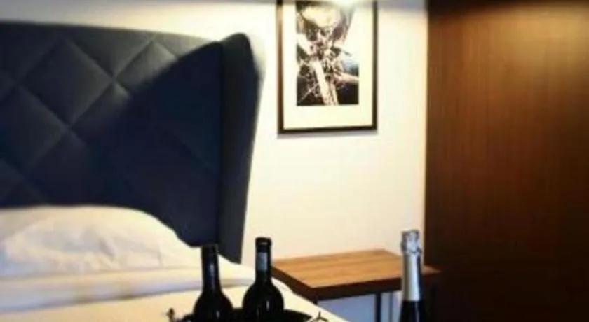 Bed in Cube 8teens Boutique Suite by Nest Home