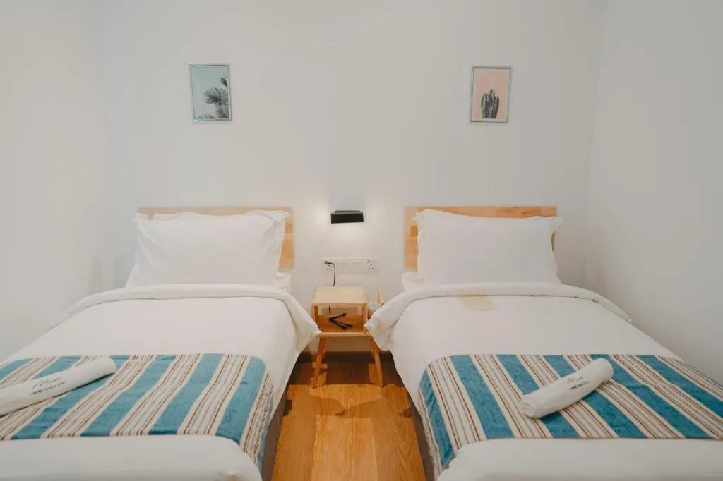 Bed in Bilik-Bilik by MUO