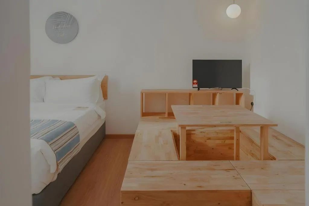 Bed in Bilik-Bilik by MUO