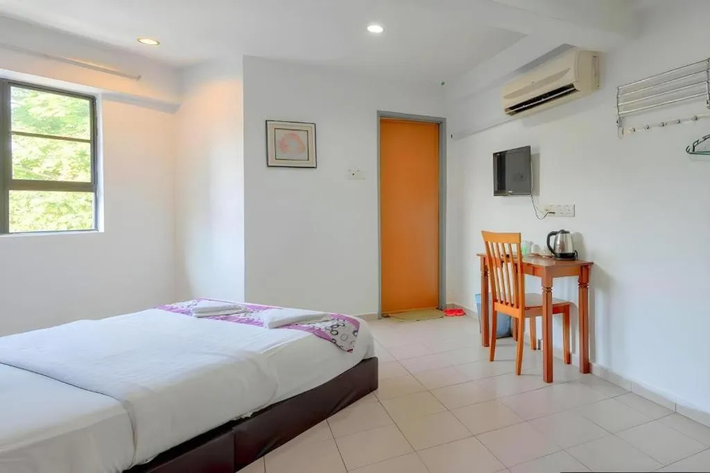 Bed in OYO 89874 Gs Golden Star Hotel