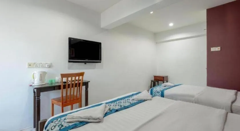 Bed in OYO 89874 Gs Golden Star Hotel