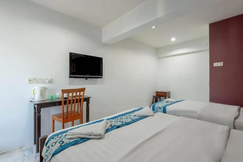 Bed in OYO 89874 Gs Golden Star Hotel