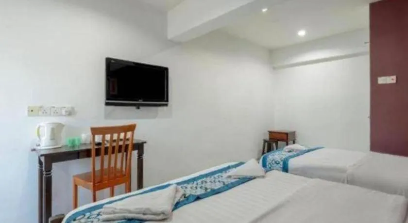 Bed in OYO 89874 Gs Golden Star Hotel