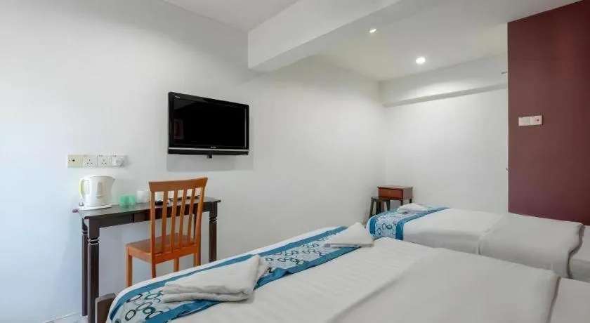 Bed in OYO 89874 Gs Golden Star Hotel