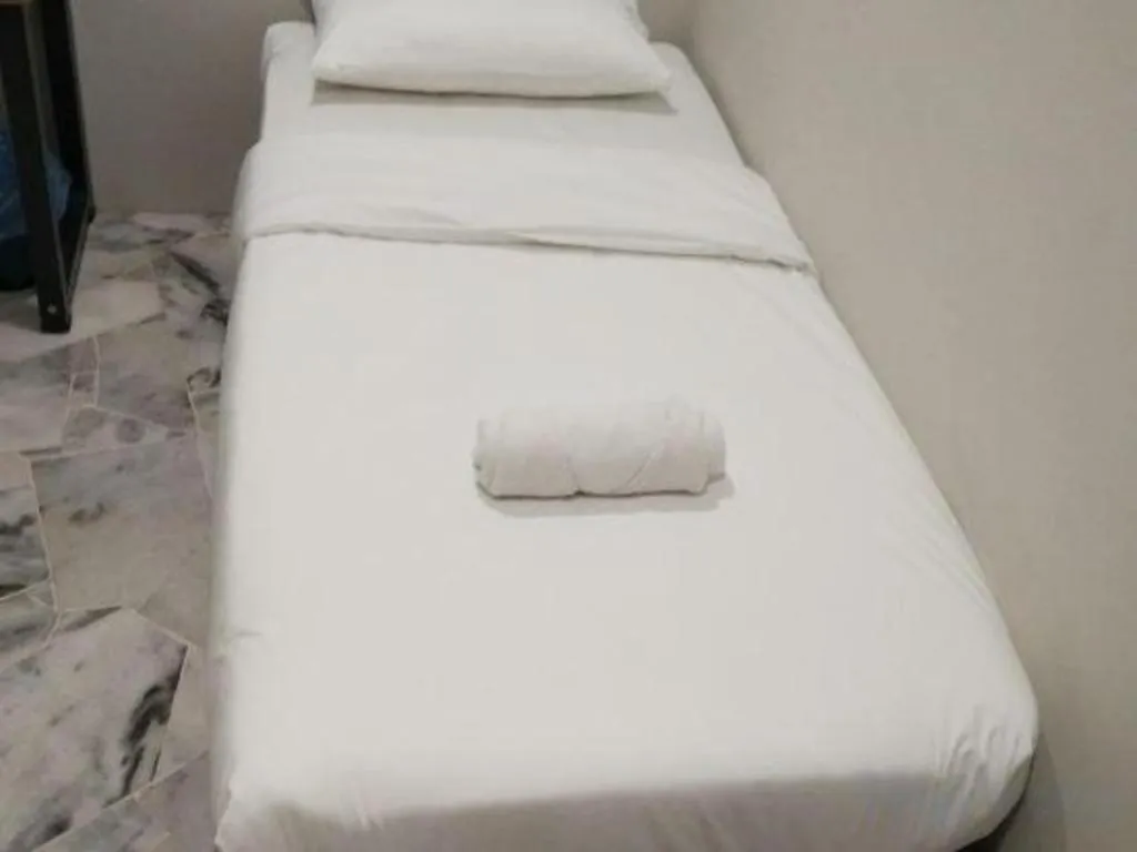 Bed in OYO 89874 Gs Golden Star Hotel