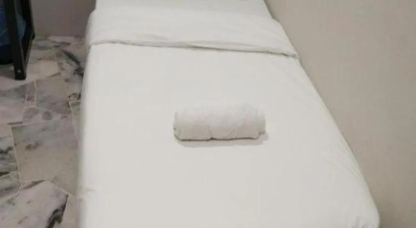 Bed in OYO 89874 Gs Golden Star Hotel