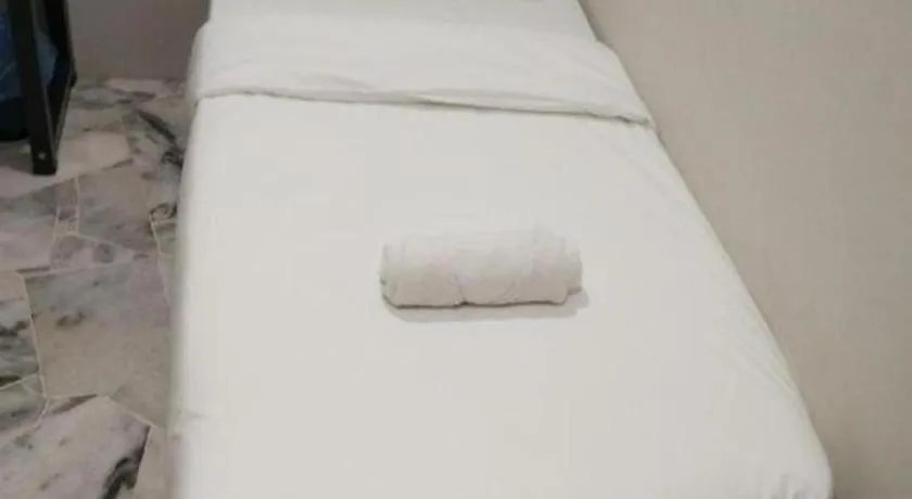 Bed in OYO 89874 Gs Golden Star Hotel