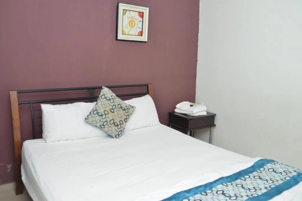 Bed in OYO 89874 Gs Golden Star Hotel