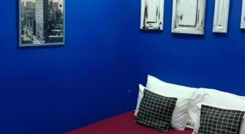 Bed in Oyasumi Hotel