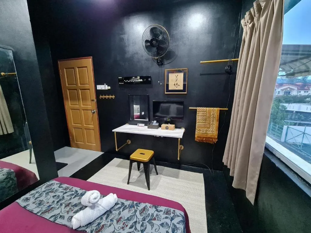 Bed in Oyasumi Hotel