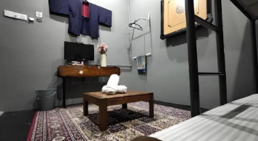 Bed in Oyasumi Hotel