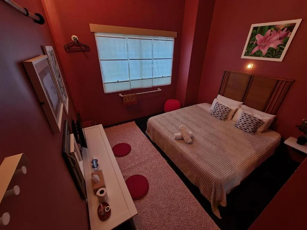 Bed in Oyasumi Hotel