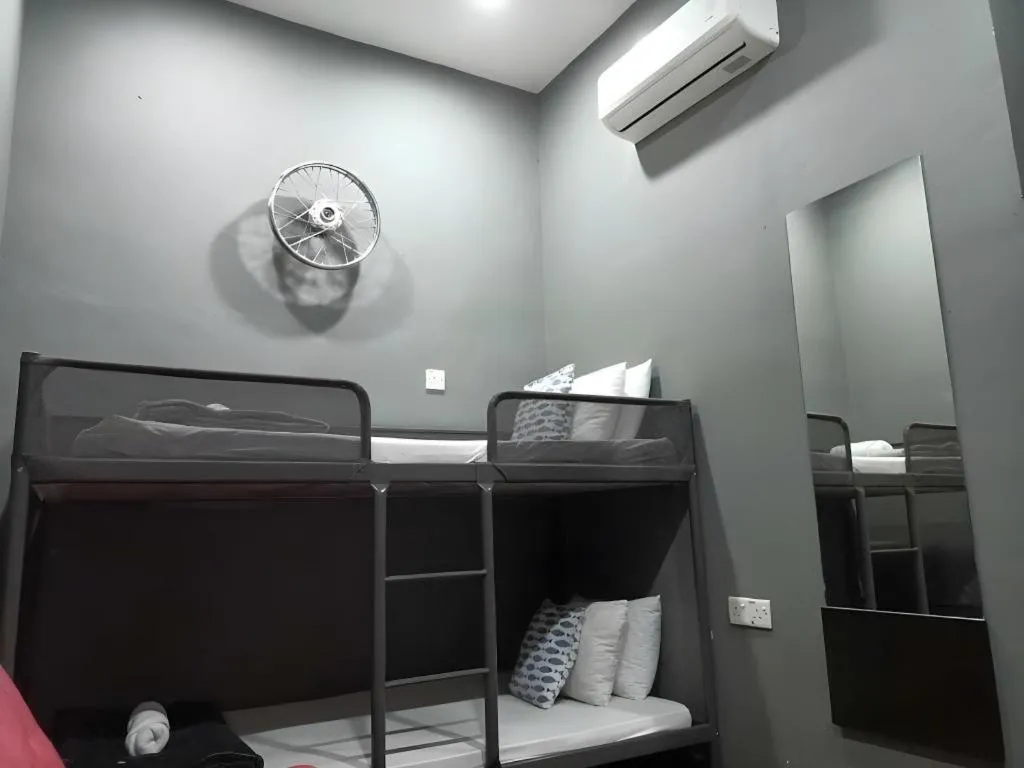 Bed in Oyasumi Hotel