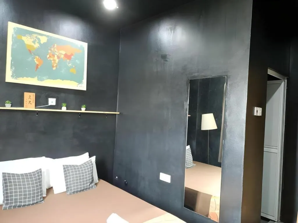 Bed in Oyasumi Hotel