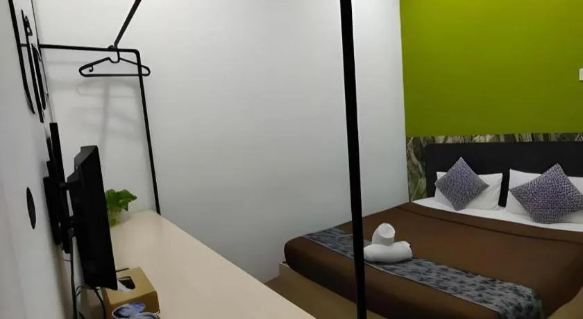 Bed in Oyasumi Hotel