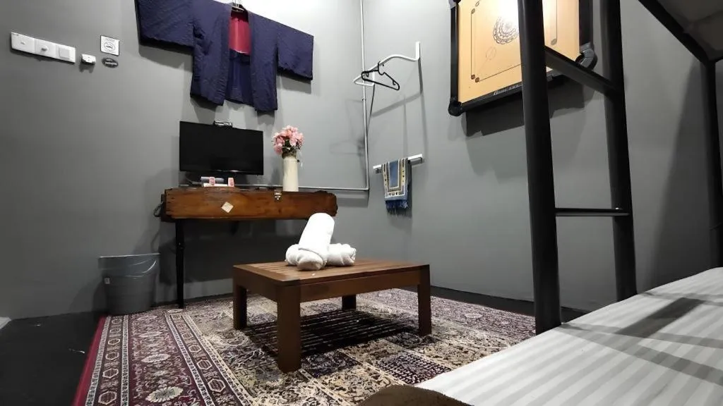 Bed in Oyasumi Hotel