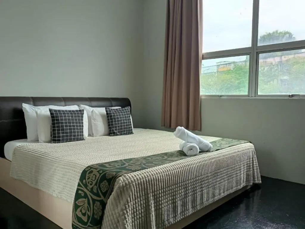 Bed in Oyasumi Hotel