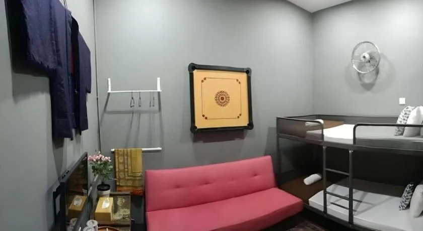 Bed in Oyasumi Hotel