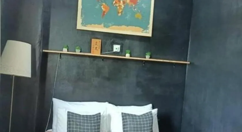 Bed in Oyasumi Hotel