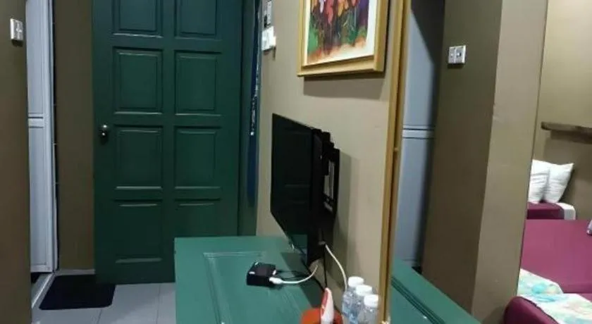 Bed in Oyasumi Hotel