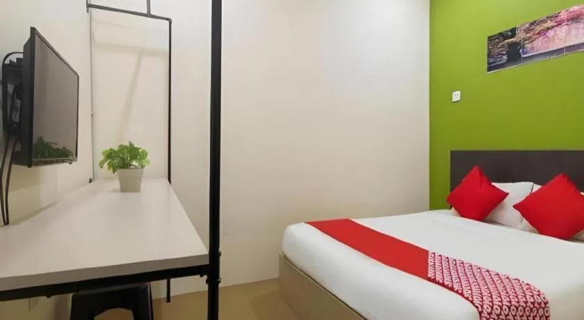 Bed in Oyasumi Hotel