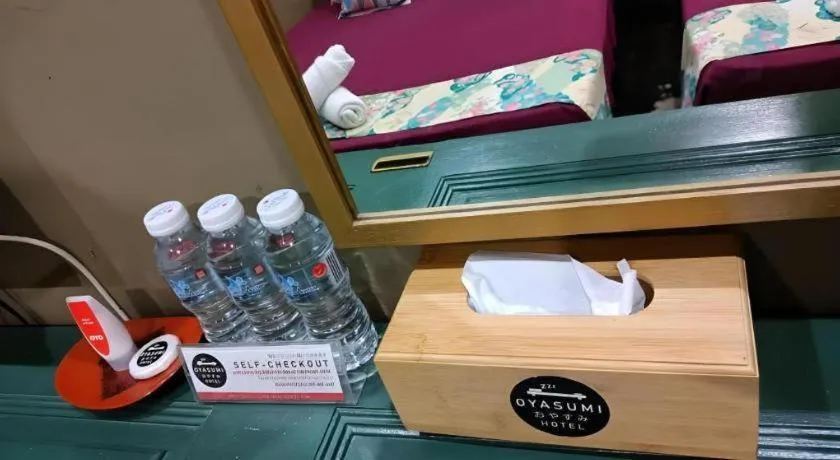 Bed in Oyasumi Hotel