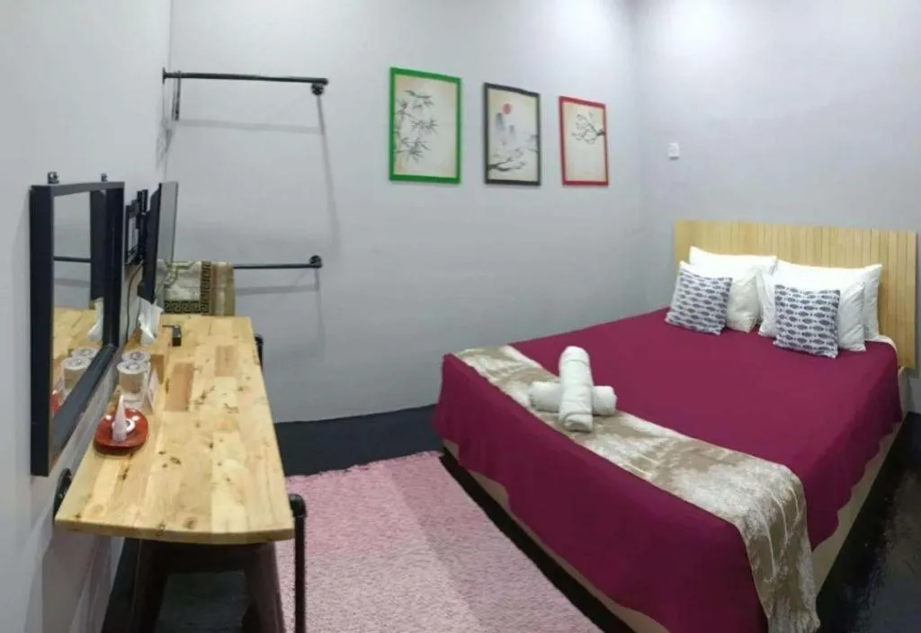 Bed in Oyasumi Hotel