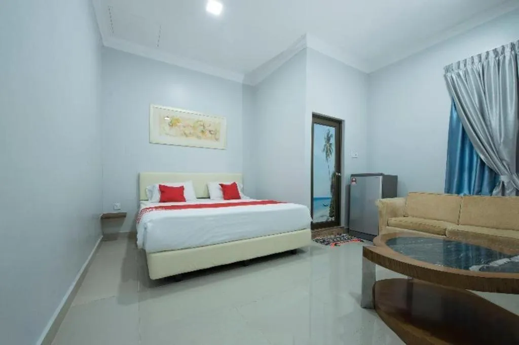 Bed in OYO 90234 Sungai Rengit City Resort 2