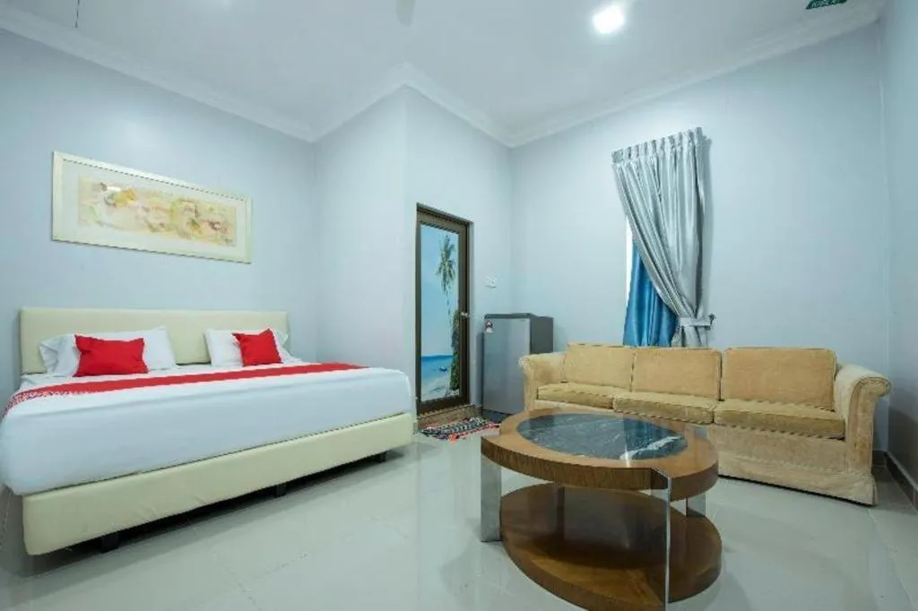 Bed in OYO 90234 Sungai Rengit City Resort 2