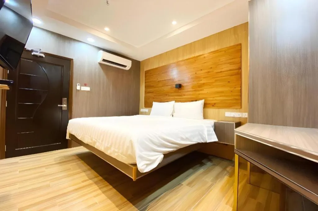 Bed in OYO 90262 Kota Kinabalu Homestay, Villa & Suite Boutique