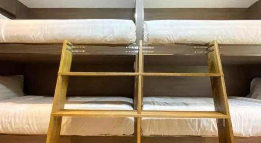 Bed in OYO 90262 Kota Kinabalu Homestay, Villa & Suite Boutique